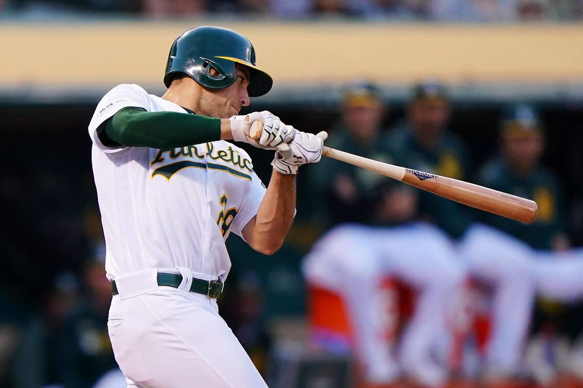 OAKLAND, CALIFORNIA - JUNE 17: Matt Olson #28 of the Oakland Athletics drives in two runs during the third inning against the Baltimore Orioles at Ring Central Coliseum on June 17, 2019 in Oakland, California. (Photo by Daniel Shirey/Getty Images)