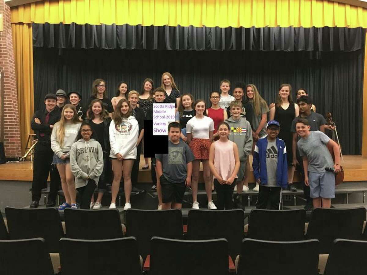Scotts Ridge Middle School held its annual Variety Show on June 11 showcasing a wide variety of talents and creative acts. This year's production included musicians, singers, dancers, a comedian, and a kazoo player. Staff members were sprinkled into participation to make it a memorable experience for all.
