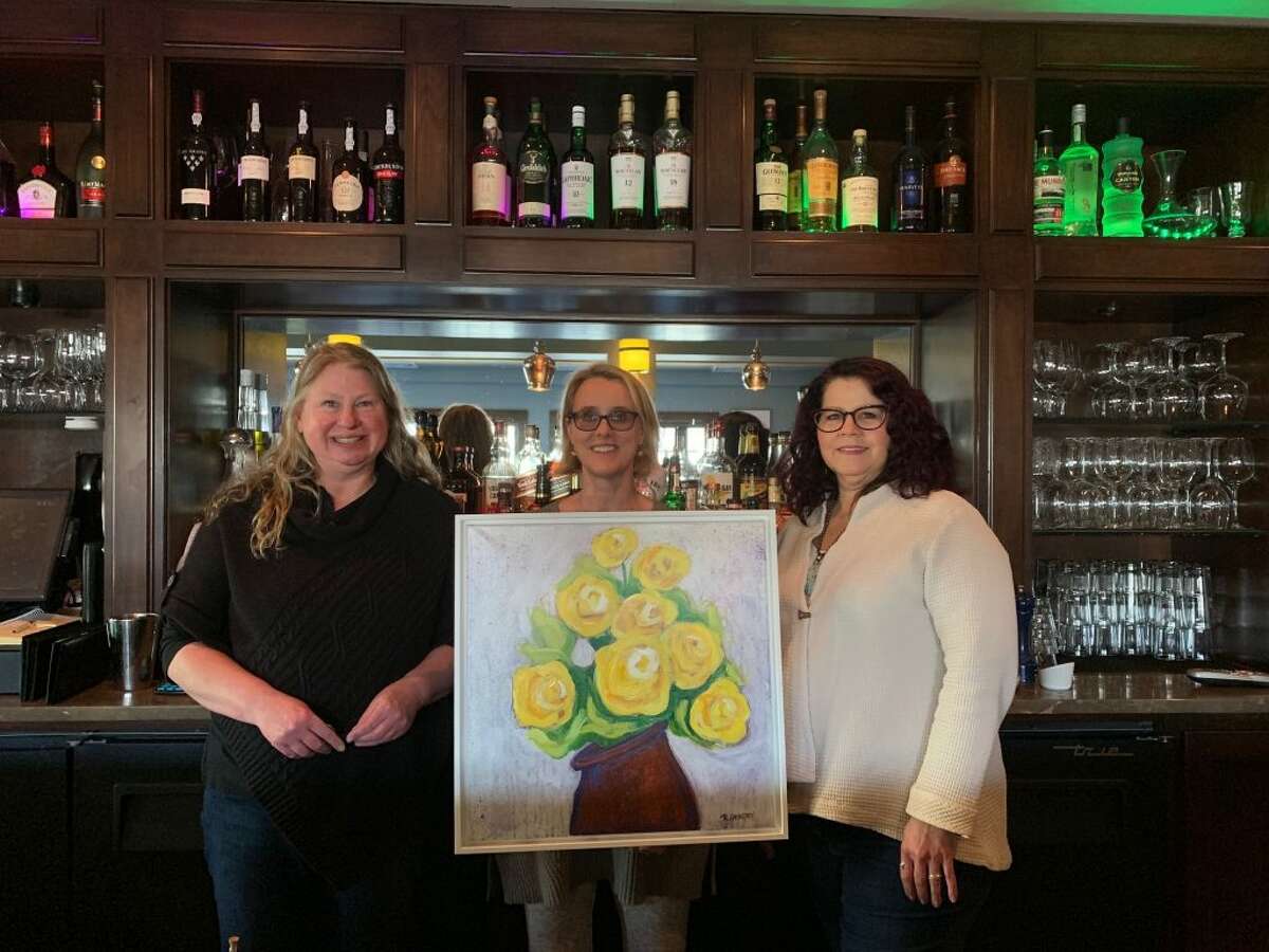 Pictured from right to left: Artist Rhonda Gentry, Amanda Cordano and Birgitta Stone. Cordano and Stone are Ridgefield League of Women Voters members.