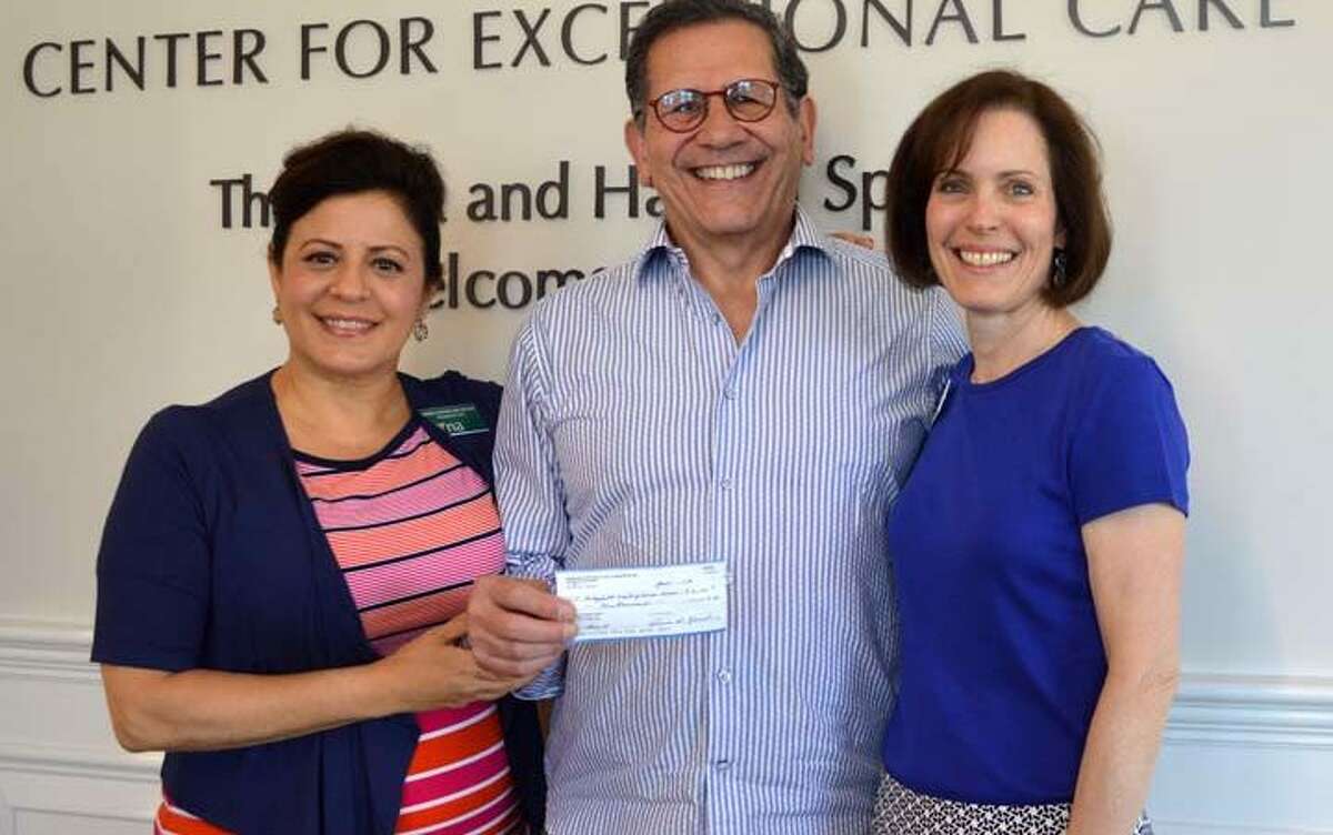 Rotarian Rich Vazzana (center) presents grant to RVNA President & CEO Theresa Santora (left) and RVNA Director of Philanthropy MJ Heller last summer. Vazzana was appointed to the Planning and Zoning Commission Tuesday, April 16.
