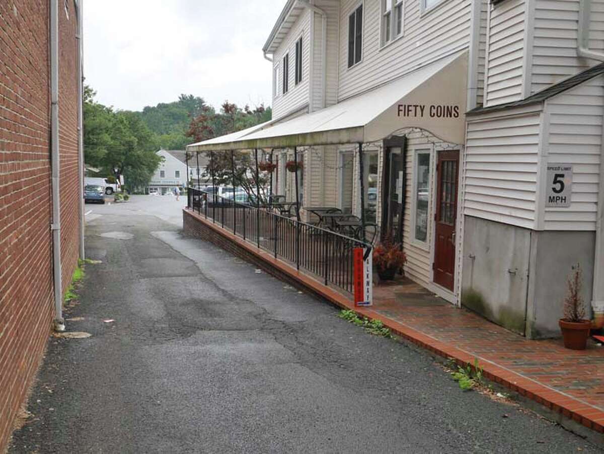 The former Fifty Coins storefront on Main Street will have a new tenant this spring. Tablao Wine Bar and Restaurant, which has a location in South Norwalk, is planning to move into the vacant space. — Steve Coulter photo
