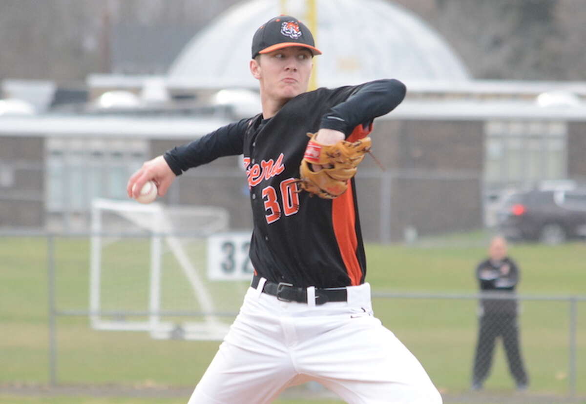 Matt DeLuca throws a pitch during Ridgefield's 2-0 win over Trumbull. — Andy Hutchison photo
