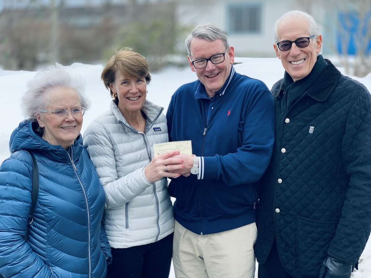Left to right: Cathy Potel of the Ridgefield Thrift Shop; Carol Gardell, treasurer of the Ridgefield Thrift Shop; Frank Coyle, chairman of Ridgefield Housing Authority; and Vincent Liscio, Commissioner of Ridgefield Housing Authority.