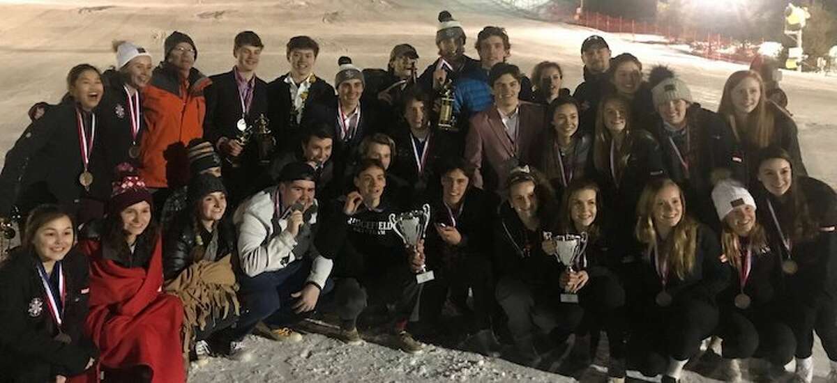 The Ridgefield High boys and girls ski teams both won trophies with top-three finishes at the State Open championships. — J. Bornstein photo