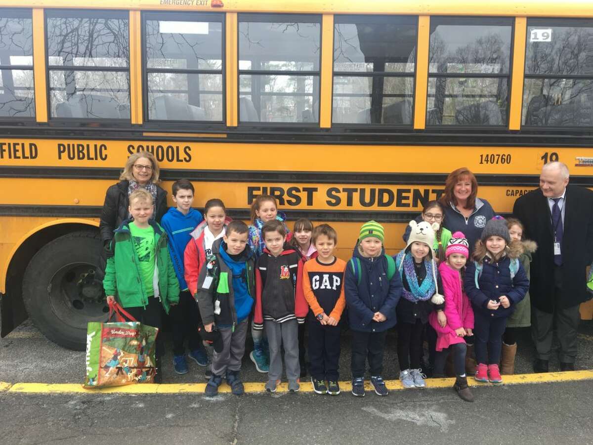 New superintendent Dr. Williams Collins rode the bus with Farmingville elementary students Feb. 19. It was his second day as the school district's top officials.
