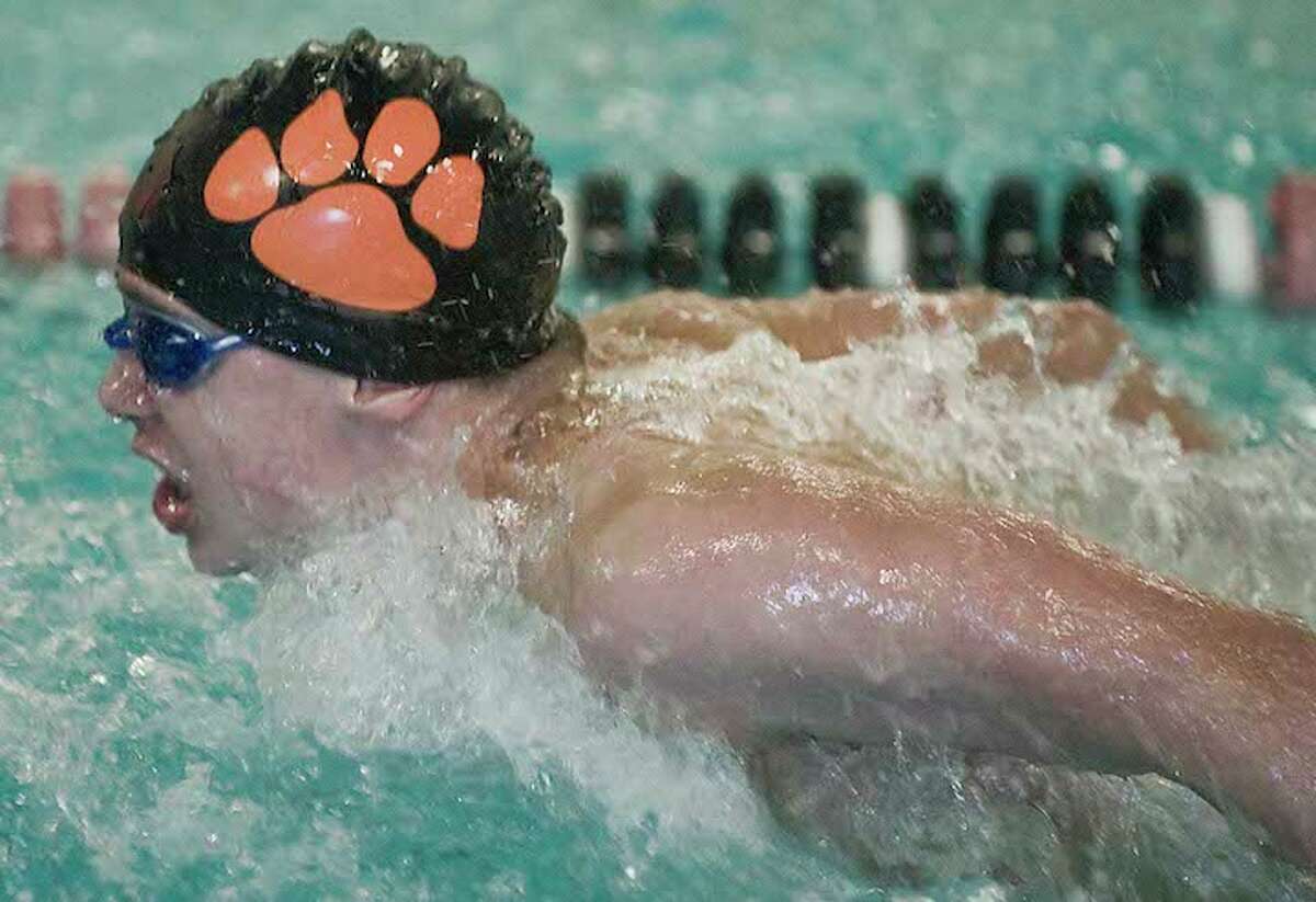 Kai O'Malley and the Ridgefield boys swim team ended the regular season with a 10-0 record. Photo: Scott Mullin / Hearst Connecticut Media