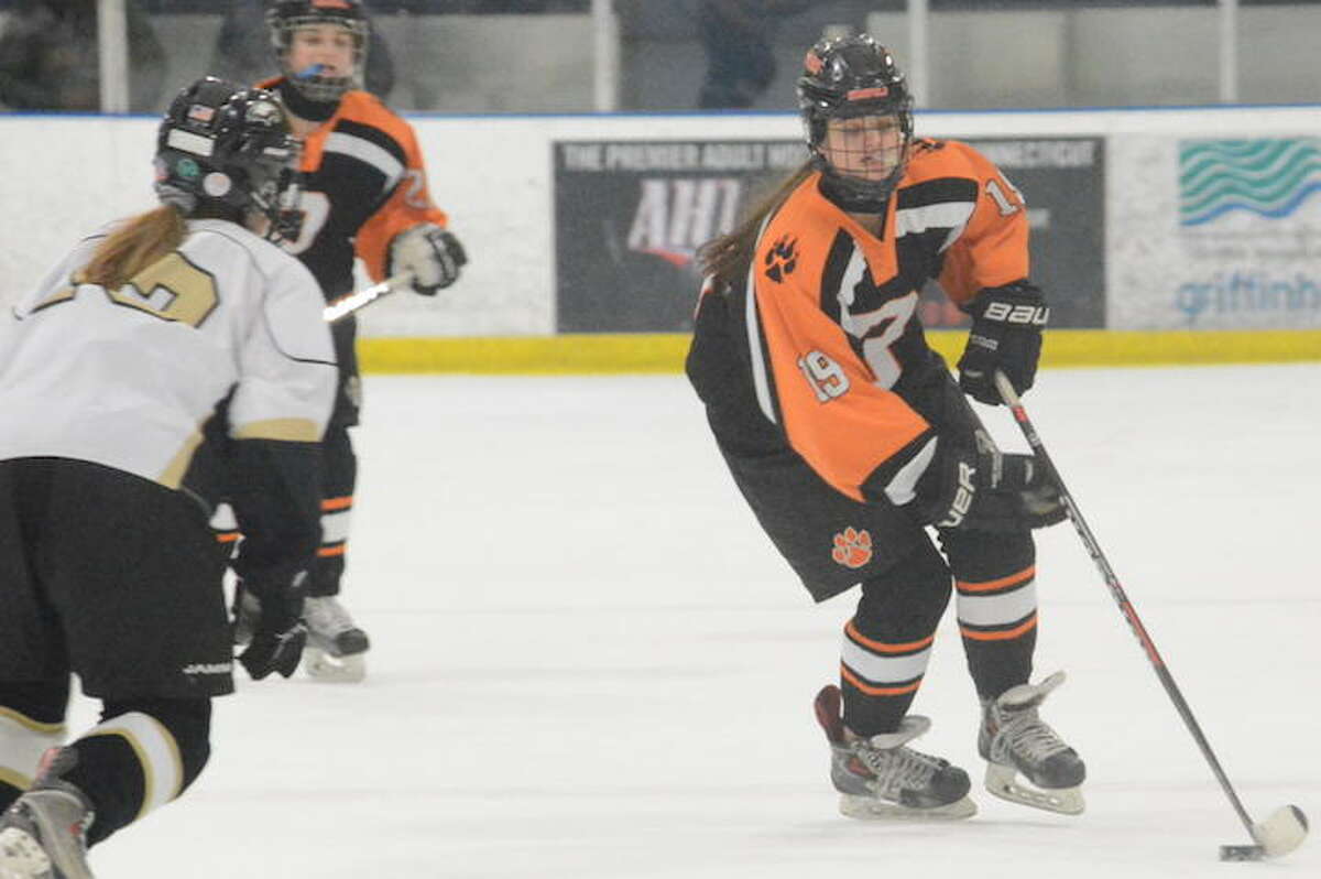 Julia Bongo controls the puck during Monday's win over Trumbull/St. Joseph. — Andy Hutchison photo