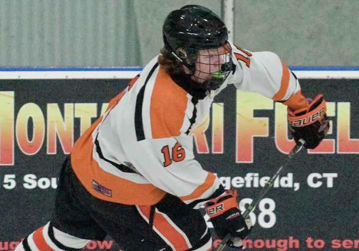 Kevin McNicholas and the Ridgefield High boys hockey team stayed unbeaten with a 5-2 win over Greenwich. — Scott Mullin photo