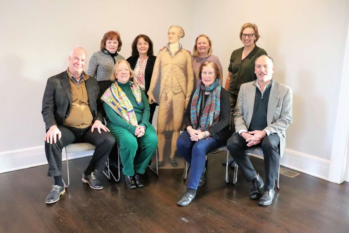Revisiting the Founding Era Planning Committee, with special guest Alexander Hamilton. Back row, from left to right: Sharon Dunphy, Ridgefield Historical Society; Lesley Lambton, Ridgefield Library; Hilary Micalizzi, Keeler Tavern Museum; Hildi Grob, Keeler Tavern Museum. Front row, left to right: Todd Brewster, Connecticut Project for the Constitution; Sara Champion, Drum Hill Chapter of the DAR; Laurie McGavin Bachmann, Ridgefield Library; Peter Bachmann, Connecticut Project for the Constitution