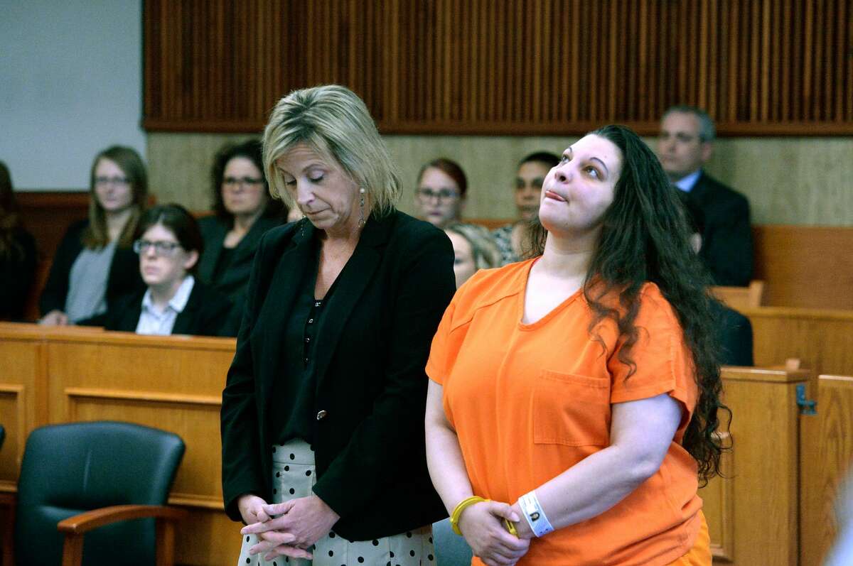 Heaven Puleksi, right, stands with her lawyer, Lara Barnett, as she awaits sentencing for killing her 3-month-old son last year. The 39-year-old will serve 15 years in state prison after pleading guilty to manslaughter.