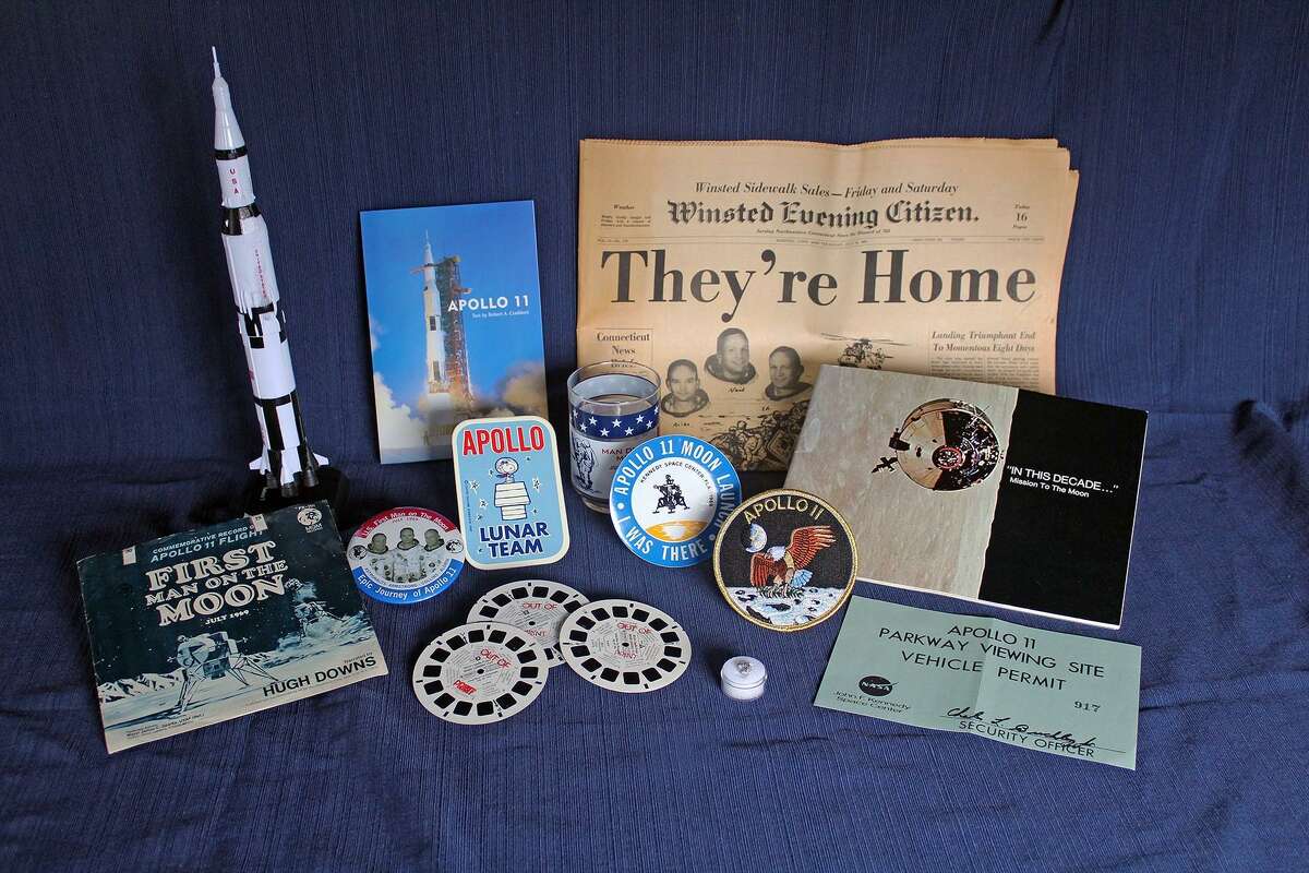 To celebrate the IMAX movie “Apollo 11: First Steps Edition” and the 50th anniversary of the first mission to the moon, The Maritime Aquarium at Norwalk will display a collection of memorabilia relating to Apollo 11 in July and August. Items — a portion of which are shown here — include newspapers from the day, buttons, patches, rocket models, a book signed by astronaut “Buzz” Aldrin, collectibles, NASA documents and a piece of the moon itself: a tiny lunar meteorite.