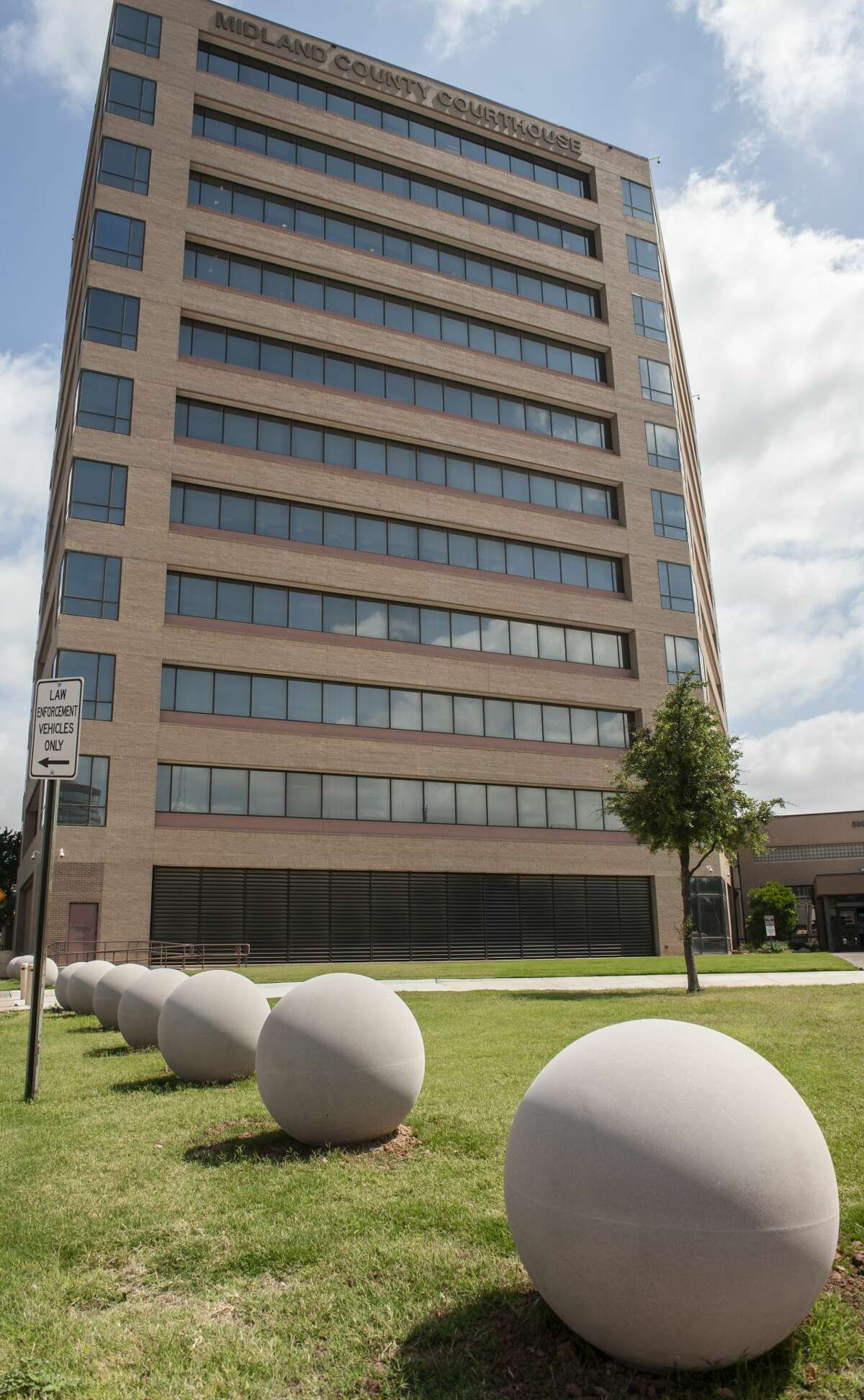 County Shows Decline In Fiscal Year Sales Tax Collection - Midland Reporter-Telegram 2 Large cement spheres line the property surrounding the Midland County Courthouse. 06/18/19 Tim Fischer/Reporter-Telegram