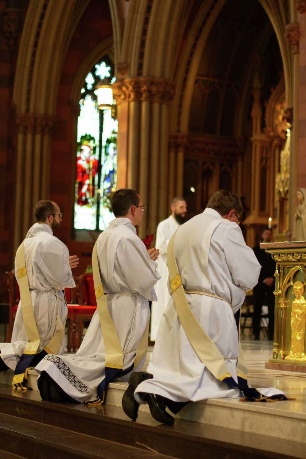 Three join priesthood in Albany ceremony