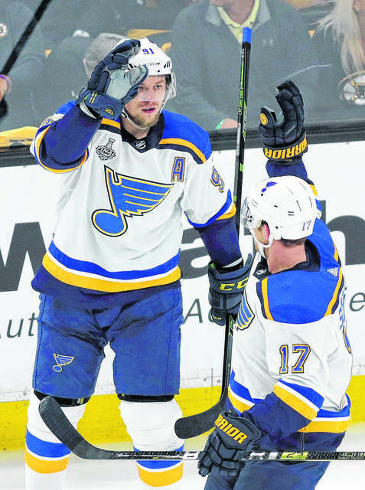 The Blues’ Vladimir Tarasenko, left, celebrates a goal against the Boston Bruins in Game 1 of the Stanley Cup Final May 27 in Boston. The Blues, who went on to win the Stanley Cup, will open their 2019 preseason schedule Sept. 16 at Dallas.