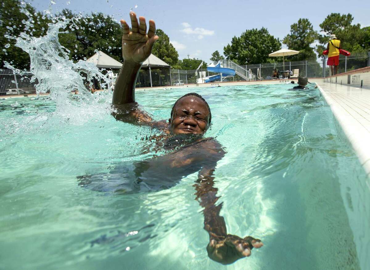 Dunia Baruani swims at the Bob and Elyse Lanier Aquatic Center at Moody Park.