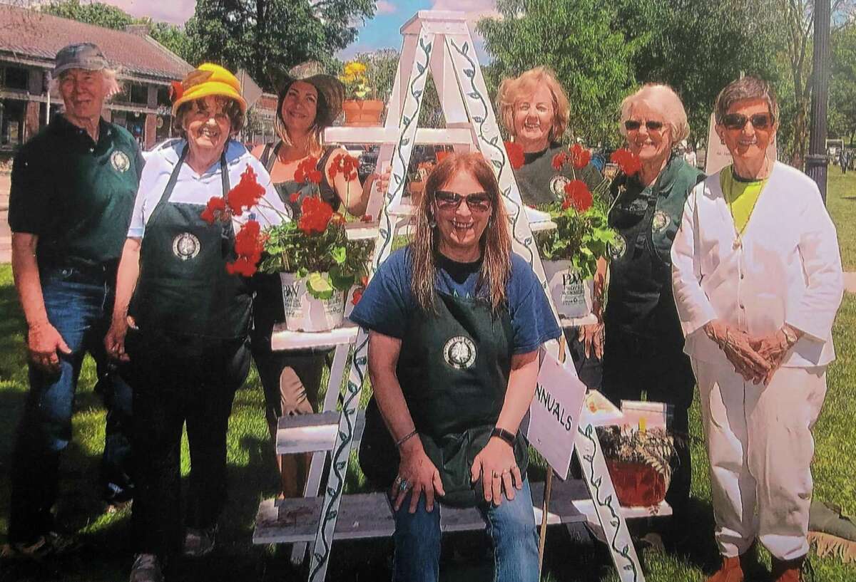 The Garden Club of New Milford held its annual plant sale May 25 on the Village Green. Several members are shown above during the festivities. They are, from left to right, in front, Jacquie McCloskey, and in back, Elizabeth O'Connor, Pat Hurley, Andrea Johnson, Sandy Gammons, Ann Stone and Barbara Clark.