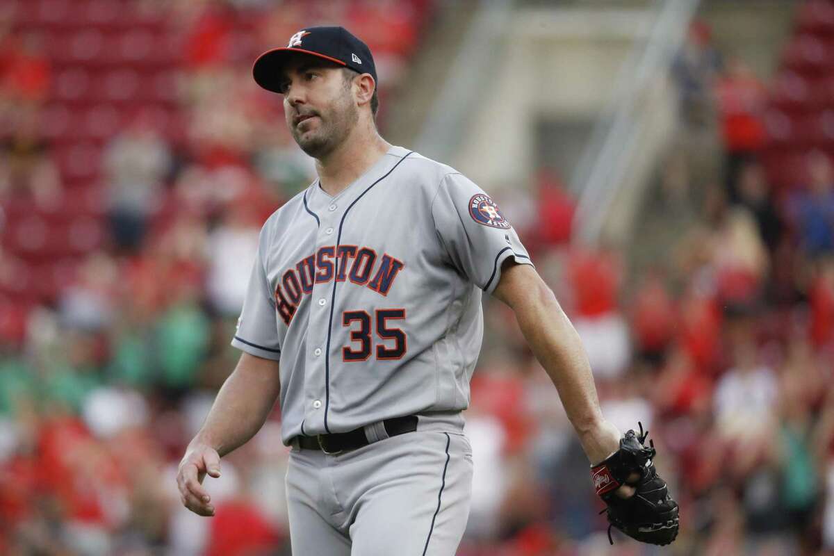 Astros pitcher Justin Verlander isn’t pleased with himself after giving up a two-run first-inning homer to the Reds’ Derek Dietrich.