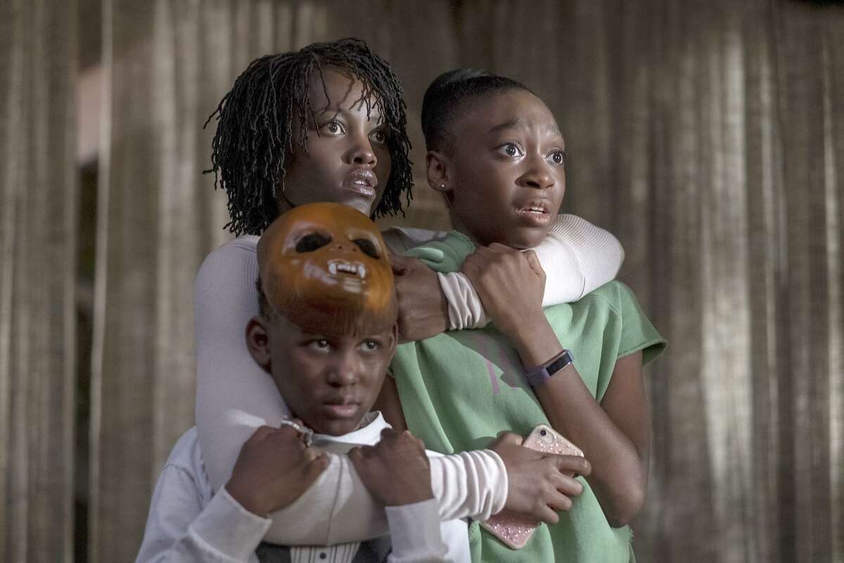 From left, Evan Alex, Lupita Nyong'o and Shahadi Wright Joseph in a scene from "Us," written, produced and directed by Jordan Peele.