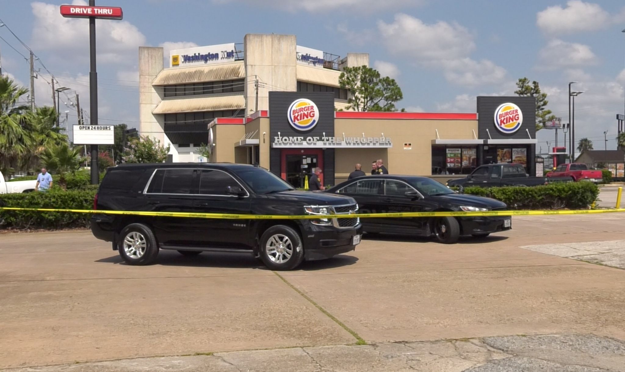 Armed man suspected in car jacking shot by Houston police outside Burger  King