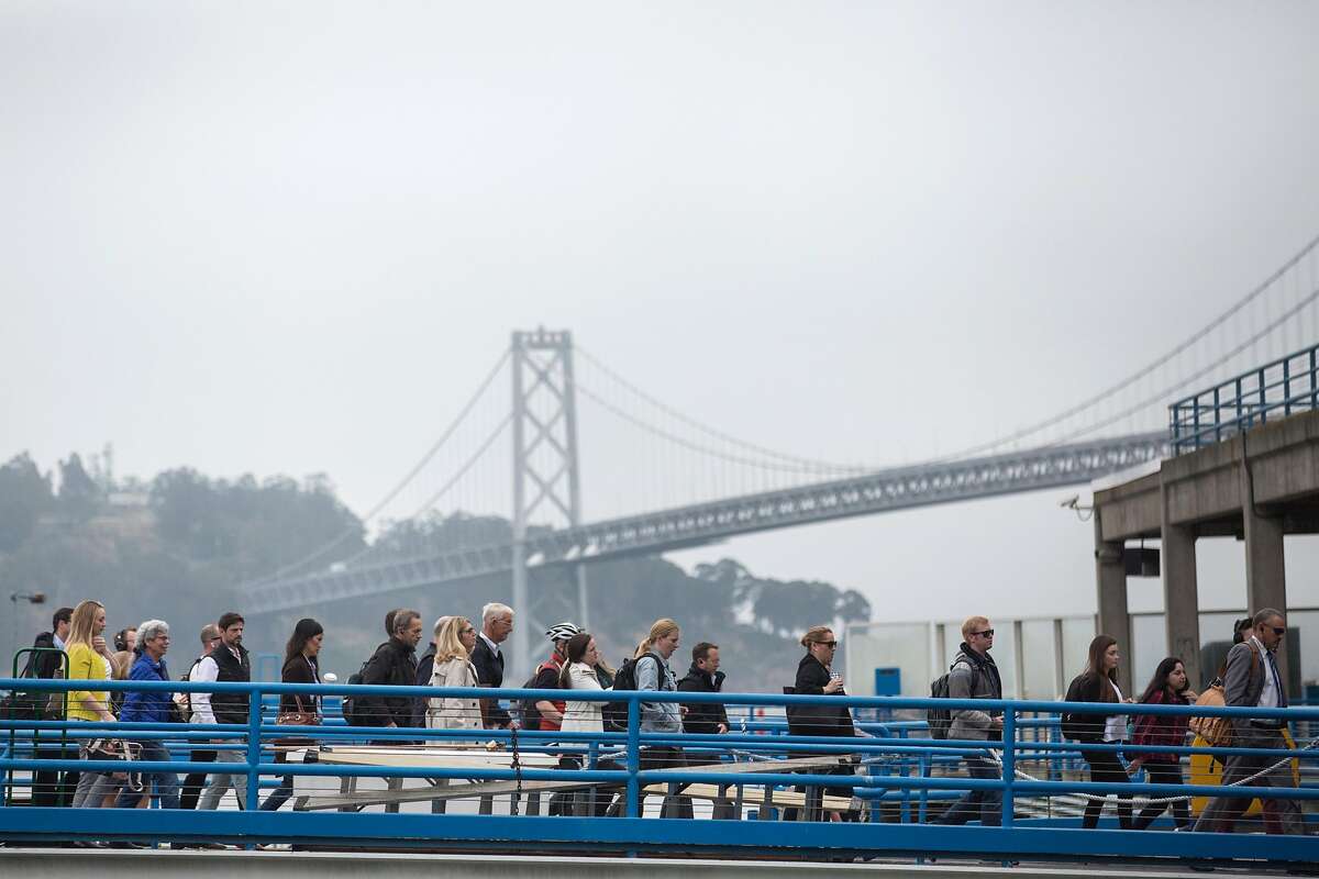 Commuters getting off the Golden Gate transit ferry at the Ferry Building on Wednesday, June 19, 2019. San Francisco, Calif.