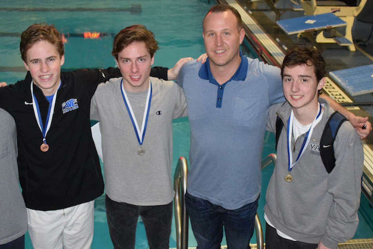 From left are Owen Stevens, Wiley Schmidt, coach Adam Vance, Timothy Luz.
