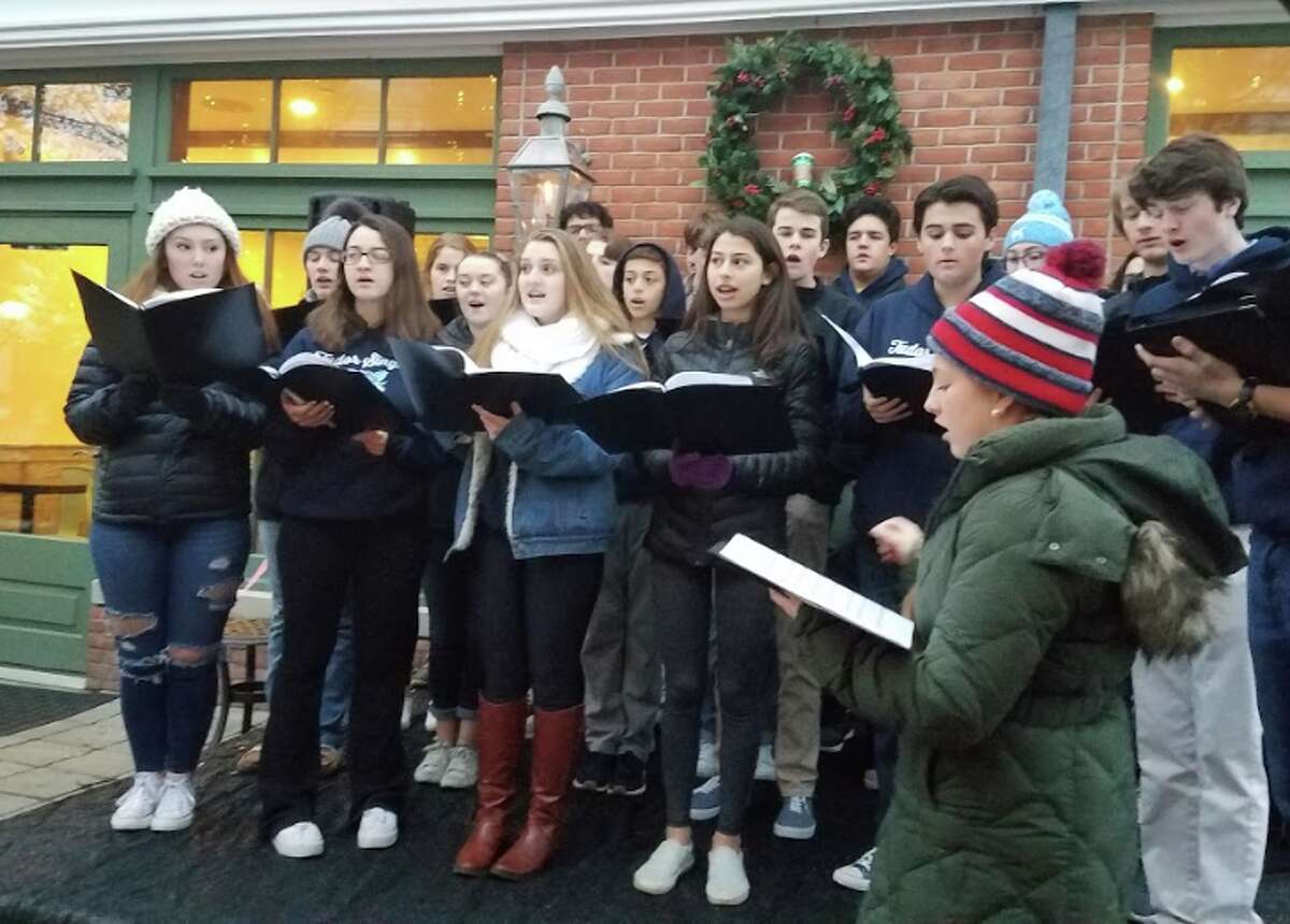 The Darien High School Tudor Singers perform Christmas carols. — Sandra Diamond Fox photo