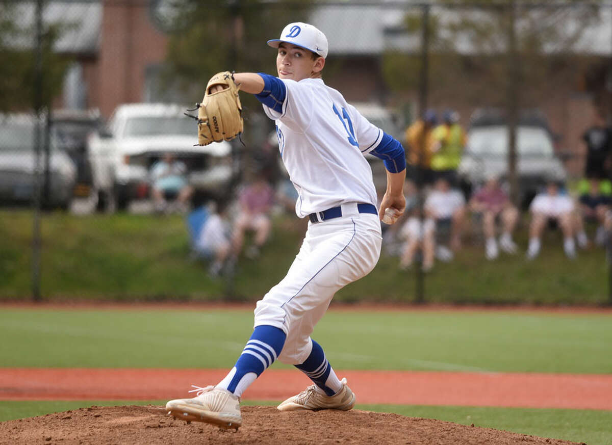 Darien's Henry Williams fires in a pitch during a Blue Wave victory in 2018. - Dave Stewart photo