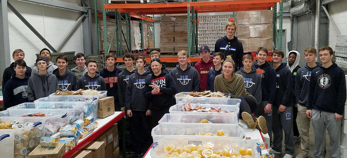 Members of the Darien boys basketball program at Filling in the Blanks on Feb. 21.