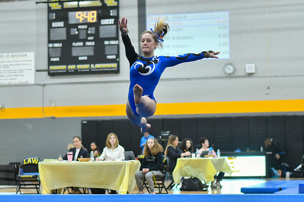 Lana Schmidt of the Darien Blue Wave competes in the floor exercise during the CIAC Class M Gymnastics Championships on Saturday February 23, 2019 at Jonathan Law High School in Milford, Connecticut. — Greg Vasil/For Hearst Connecticut Media