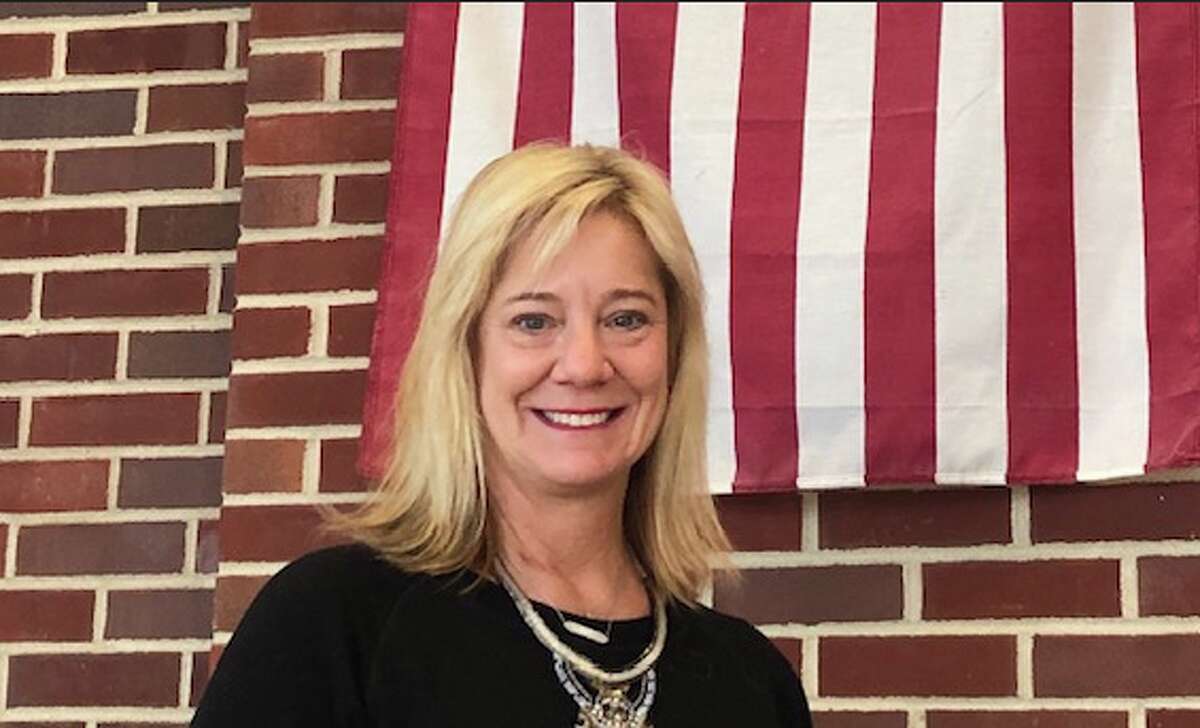 Eighth grade history teacher Lucy Berry. Berry created a program in Darien to honor town veterans by putting their names on street signs.