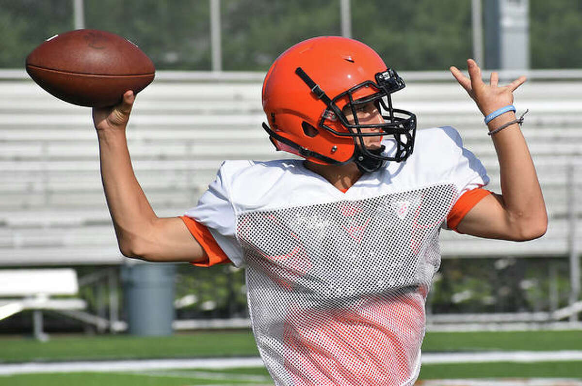Edwardsville quarterback Ty Berumen makes a pass during a workout Tuesday inside the District 7 Sports Complex.