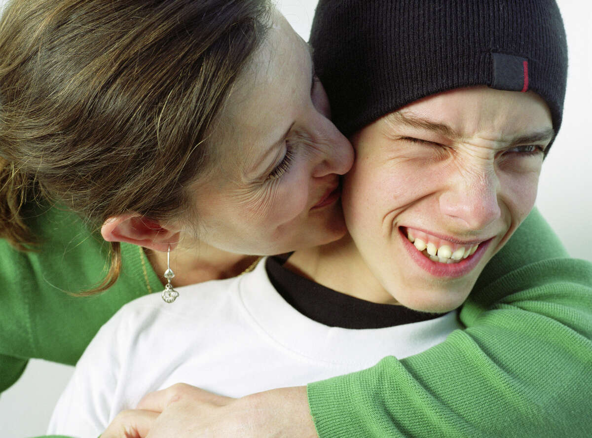 A mother reunites with her biological son.