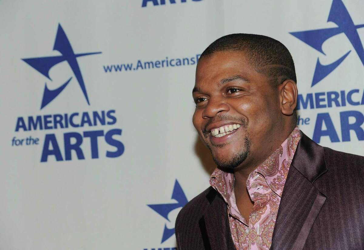 FILE - In this Oct. 6, 2008 file photo, Artist Kehinde Wiley attends the 2008 National Arts Awards presented by Americans For The Arts at Cipriani's 42nd St. in New York. Wiley will unveil in New York?s Time Square his first monumental public sculpture in response to Confederate sculptures throughout the U.S. Times Square Arts, the Virginia Museum of Fine Arts and Sean Kelly announced Thursday, June 20, 2019 that ?Rumors of War? will feature a bronze sculpture of a young, African-American dressed in urban streetwear mounted atop a horse. (AP Photo/Evan Agostini, File)