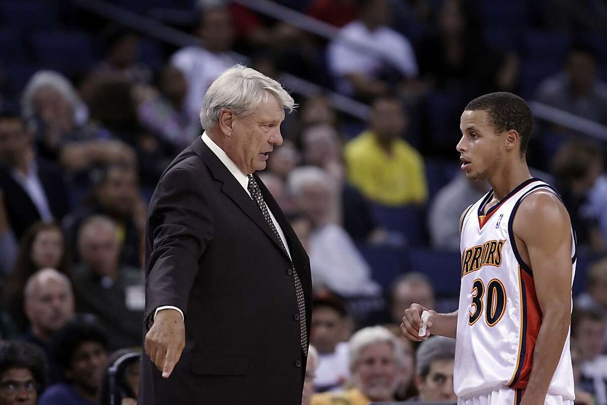 The Warriors's head coach, Don Nelson, speaks with rookie, Stephen Curry. The Golden State Warriors played the New Orleans Hornets at Oracle Arena in Oakland, Calif., on Thursday, October 22, 2009. The Warriors defeated the Hornets 126-92.