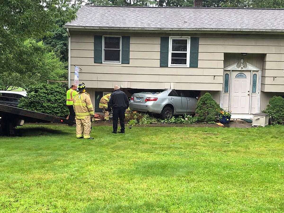 Car crashes into Sandy Hook home