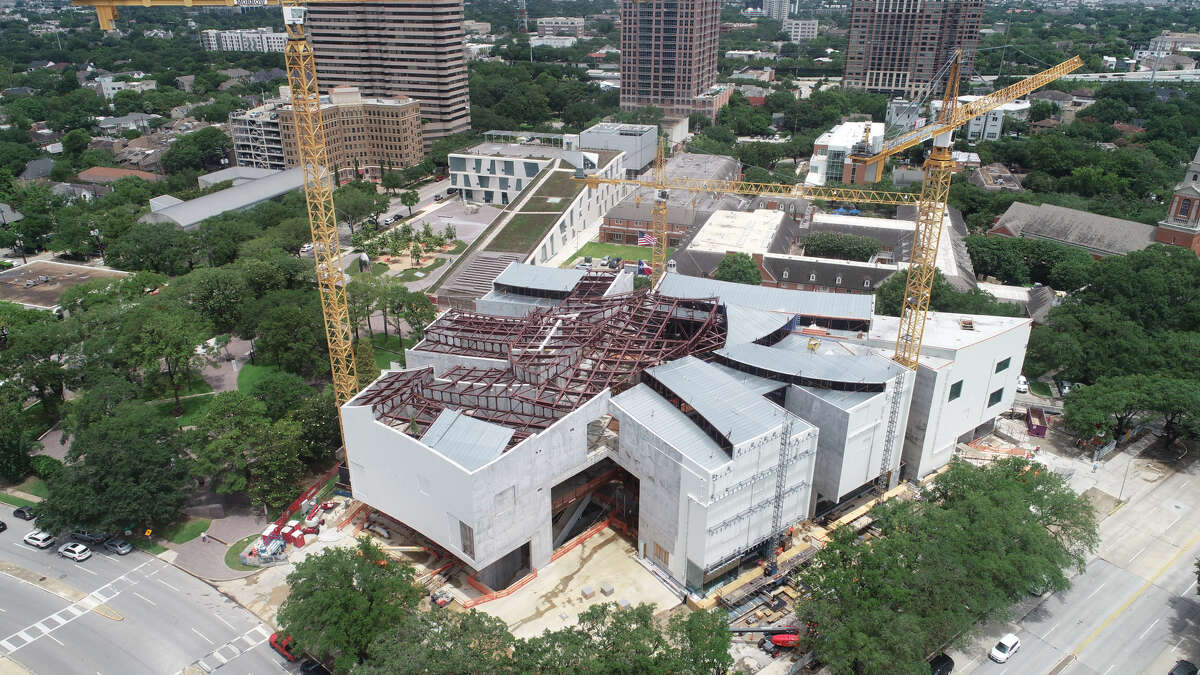 McCarthy Building Cos. and the Museum of Fine Arts, Houston recently celebrated the topping out of the Nancy and Rich Kinder Building Monday. The building, which will have a translucent-glass exterior, will open next year to house modern and contemporary art.