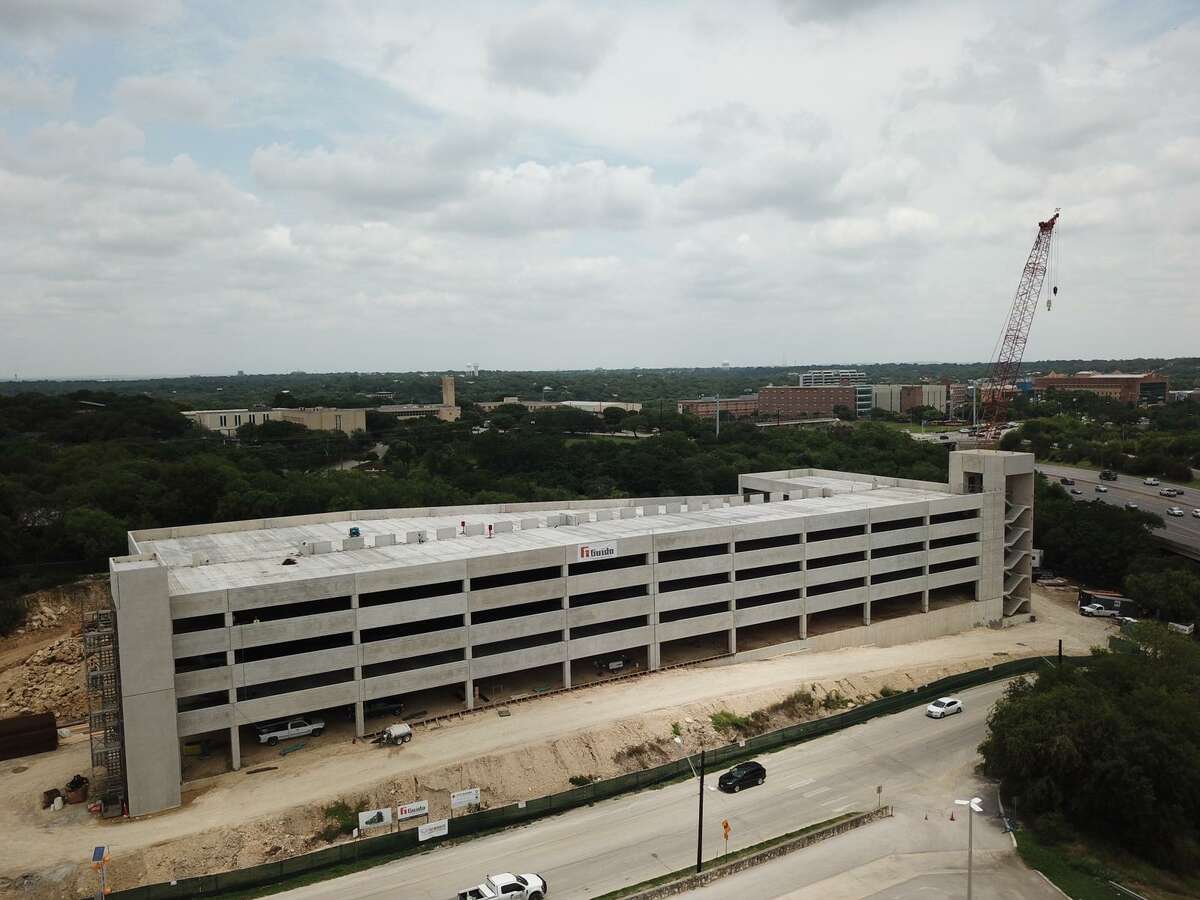 Photos from June 2019 show an updated look at the San Antonio Zoo's new parking garage which is expected to open in October.