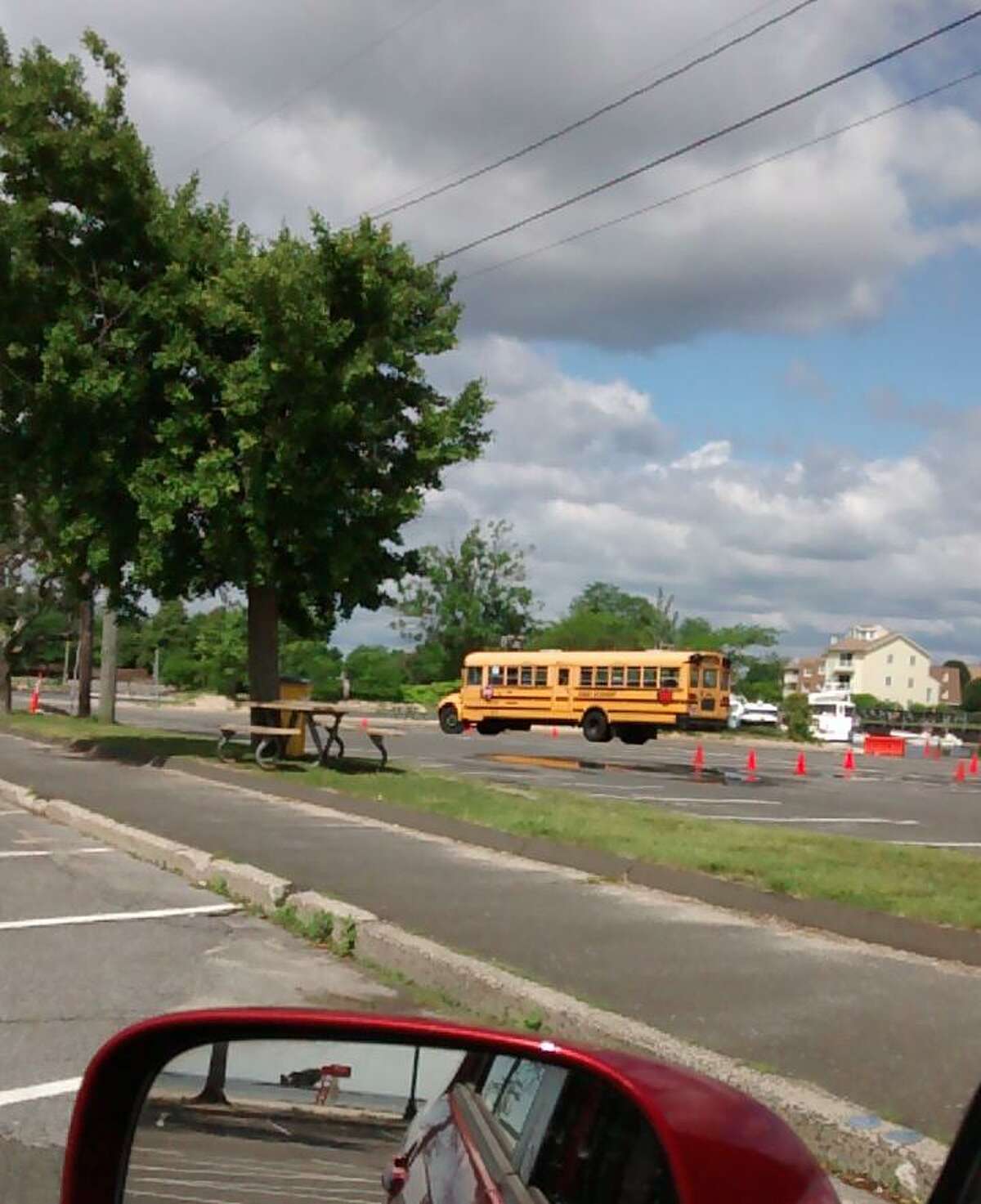 A school bus in the parking lot at Cummings Beach.