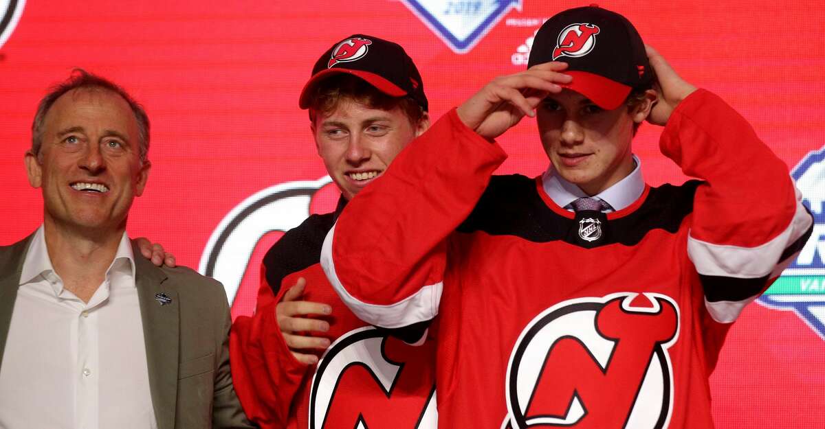 VANCOUVER, BRITISH COLUMBIA - JUNE 21: Jack Hughes smiles after being selected first overall by the New Jersey Devils during the first round of the 2019 NHL Draft at Rogers Arena on June 21, 2019 in Vancouver, Canada. (Photo by Bruce Bennett/Getty Images)