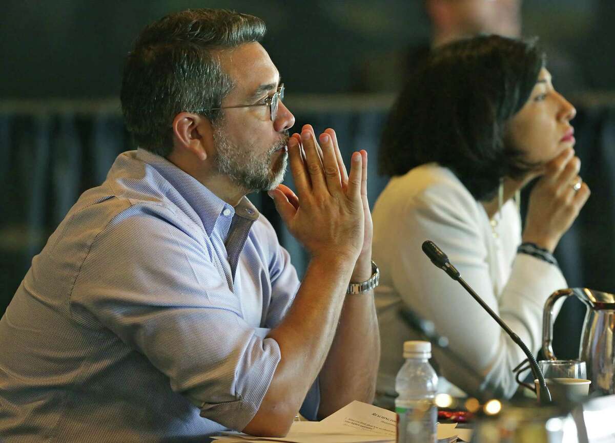 District 1 Councilman Roberto Treviño, left, listens at a budget workshop session at the Henry B. Gonzalez Convention Center on Friday, June 21, 2019. Treviño has sought to relax a restriction on contact between City Council members and businesses bidding on multi-million dollar contracts in order to give council members more time to weigh the contracts.