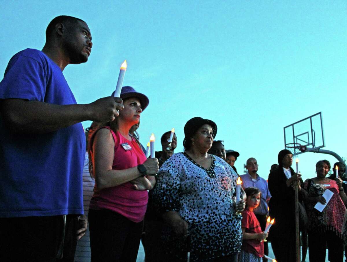 A candlelight vigil was held in honor of Juneteenth and the Sugar Land 95 at Mayfield Park on Tuesday, June 18.