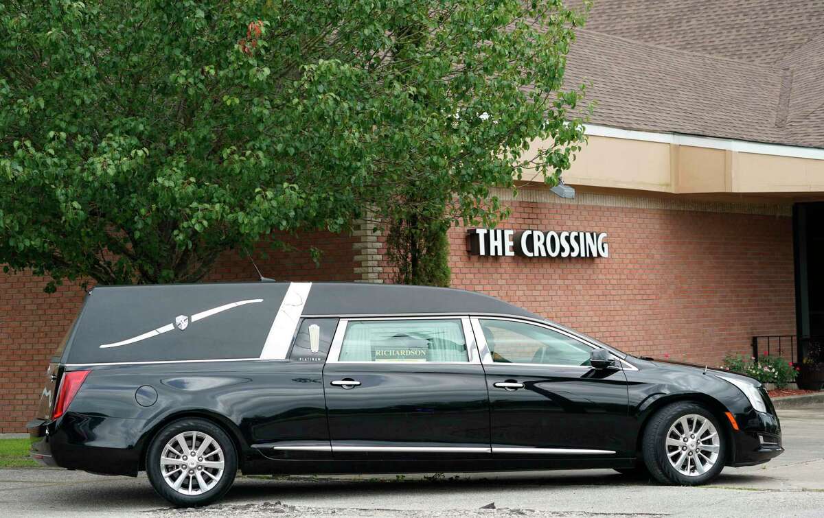 A hearse at Crossing Community Church, 3225 W. Orem Drive.