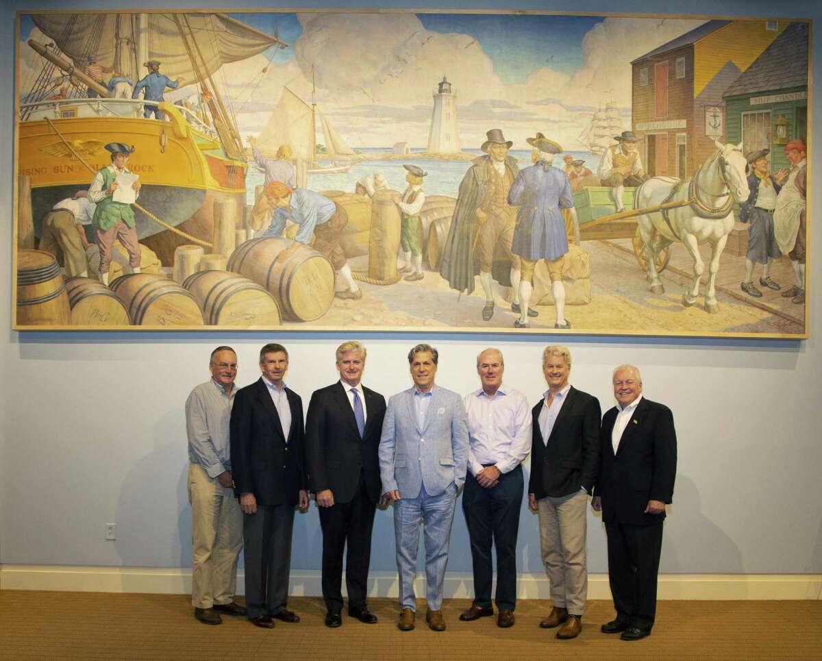 From left with mural, Phil Blagys, Black Rock Community Council; Bruce Hubler, Bill Tommins, Southern Connecticut market president, Bank of America; Ronald Marshall, Jack Collins, Mike Jehle, executive director Fairfield Museum; Mike Tetreau, Fairfield First Selectman.
