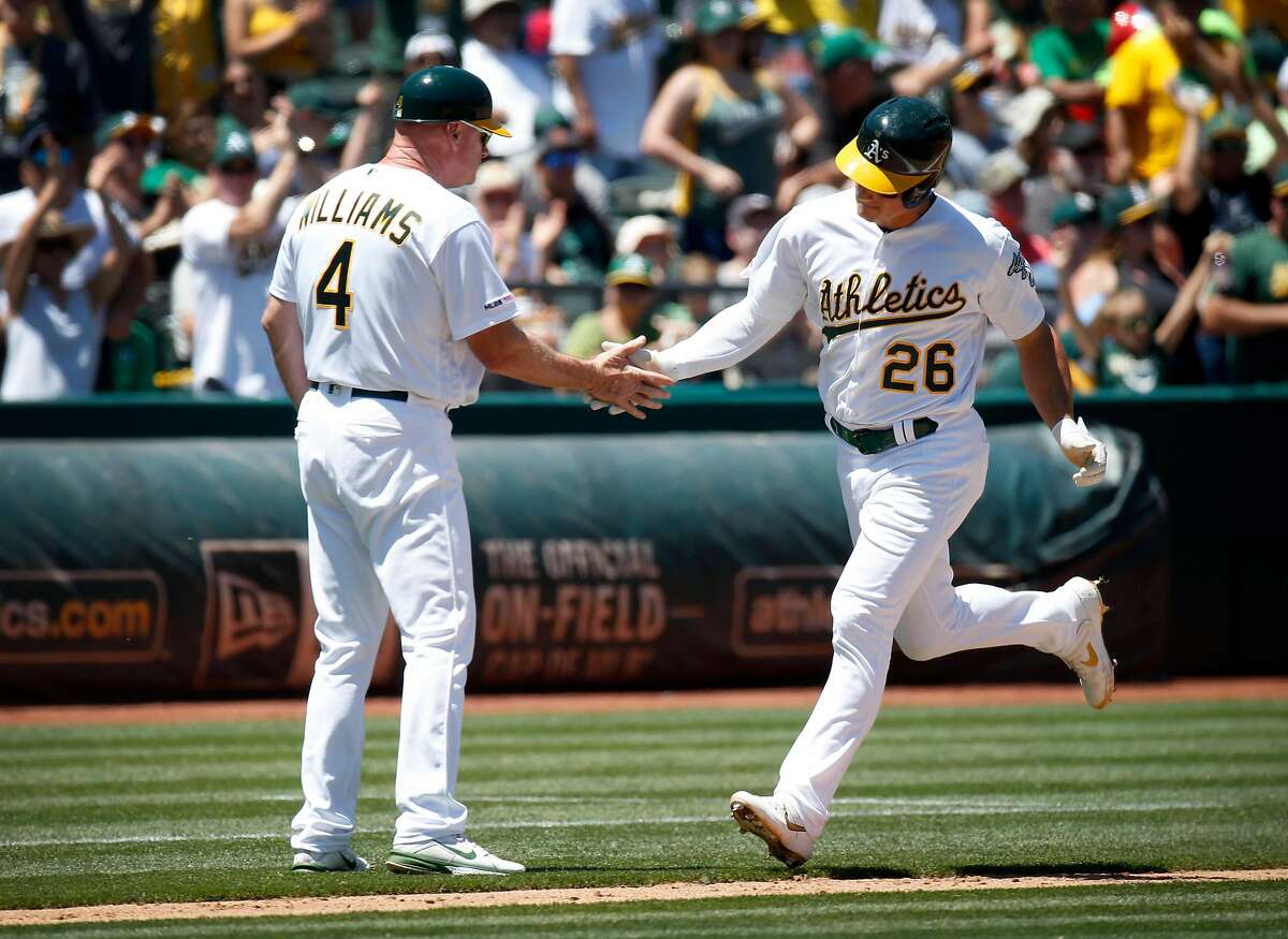MAtt Chapman (26) rounds the bases after his 3rd inning homer in the Oakland A's baseball game against the Tampa Bay Rays in Oakland, Calif. on Saturday, June 22, 2019. The A's defeated the Rays 4-2.