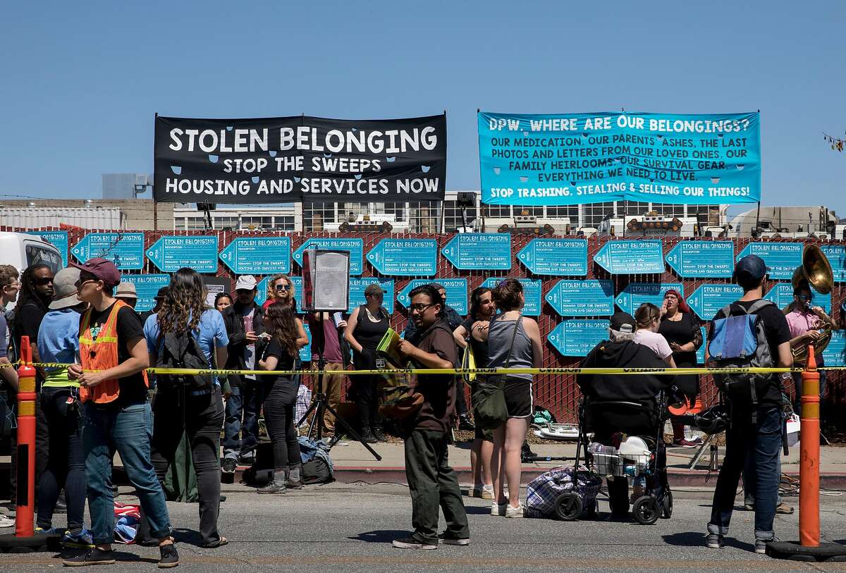 Dozens participate in a protest highlighting San Francisco Department of Public Works' controversial practice of street sweeping and property confiscation held outside of San Francisco Department of Public Works yard in San Francisco, Calif. Friday, June 21, 2019.