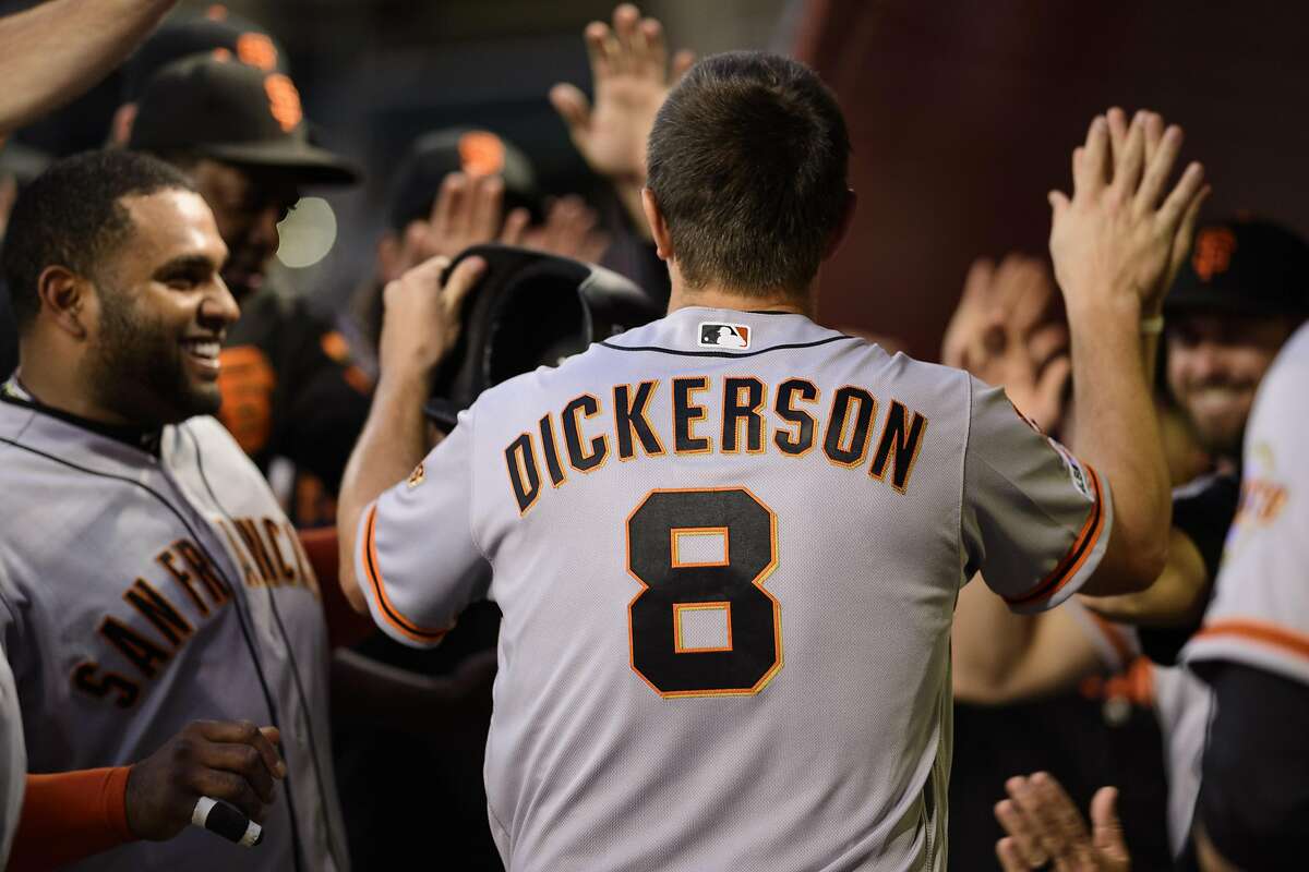 PHOENIX, ARIZONA - JUNE 22: Alex Dickerson #8 of the San Francisco Giants is congratulated in the dugout after scoring against the Arizona Diamondbacks in the second inning of the MLB game at Chase Field on June 22, 2019 in Phoenix, Arizona. (Photo by Jennifer Stewart/Getty Images)