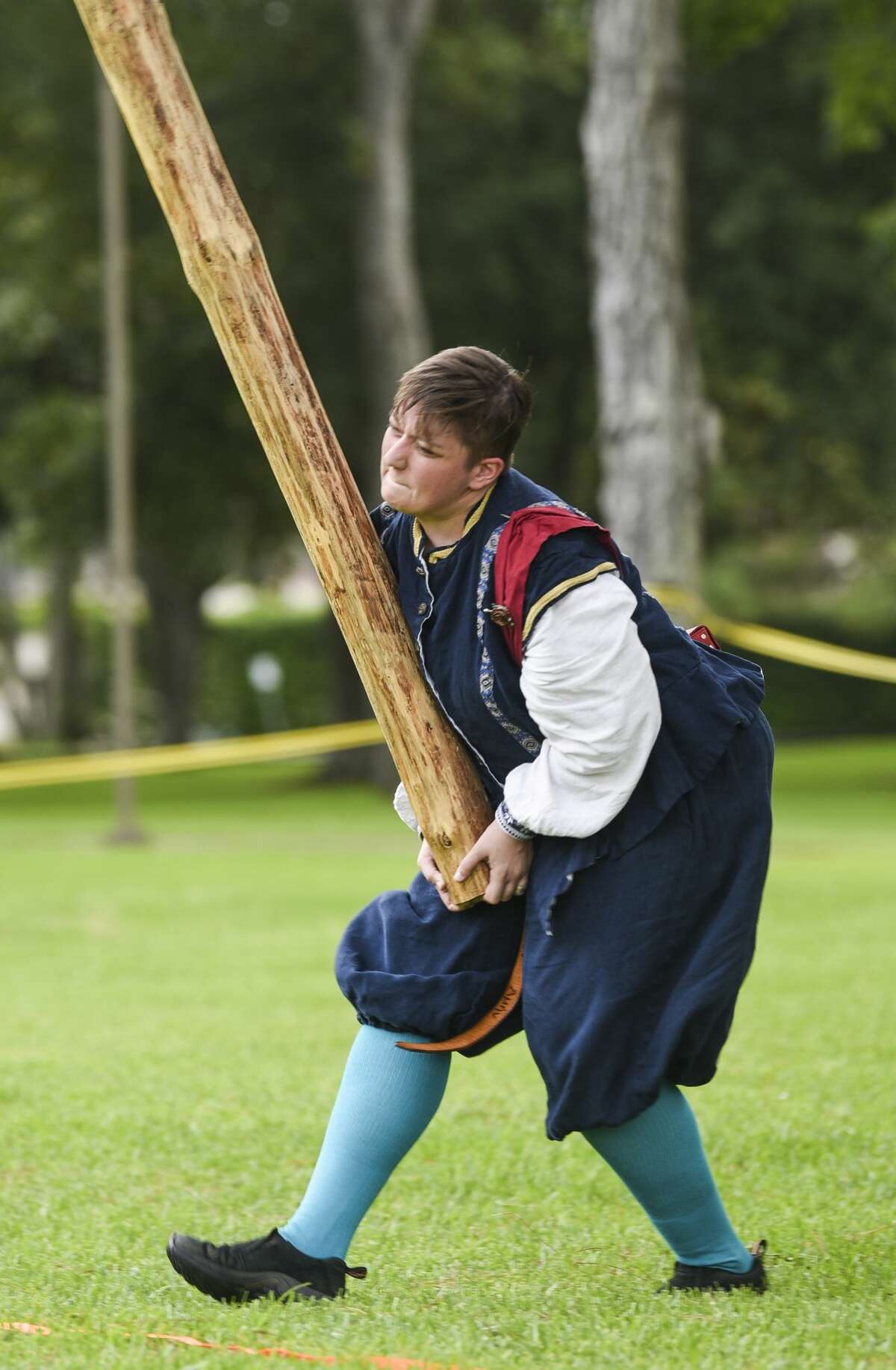 Amy Beers of Huntsville, who goes by Rosalia Del Espinar, throws a log during the caber toss event the Bordermarch Baronial Highland Games at St. Stephen's Episcopal Church Saturday afternoon. The event was put on by the Society for Creative Anachronism. The group, which is also known as SCA, research and recreate ways of life before the 17th century. Beaumont is located in the Ansteorra, Swedish for Lone Star, kingdom which includes Texas and Oklahoma. SCA members participate in many different events including making their own armor, chivalric fighting, archery and textile production. While many members choose to follow medieval Europe ideas some choose instead vikings or samurais. Photo taken on Saturday, 06/22/19. Ryan Welch/The Enterprise