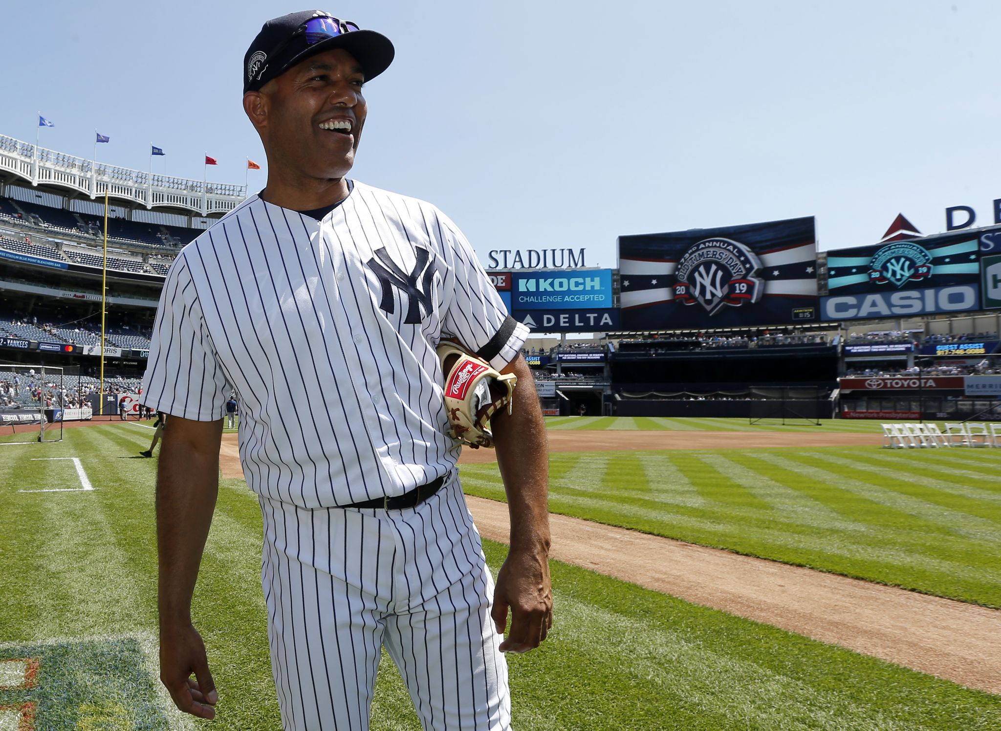 Former New York Yankees players, including Mariano Rivera, center, pose for  a picture during Old Timer's Day at Yankee Stadium, Sunday, June 23, 2019,  in New York. (AP Photo/Seth Wenig Stock Photo 