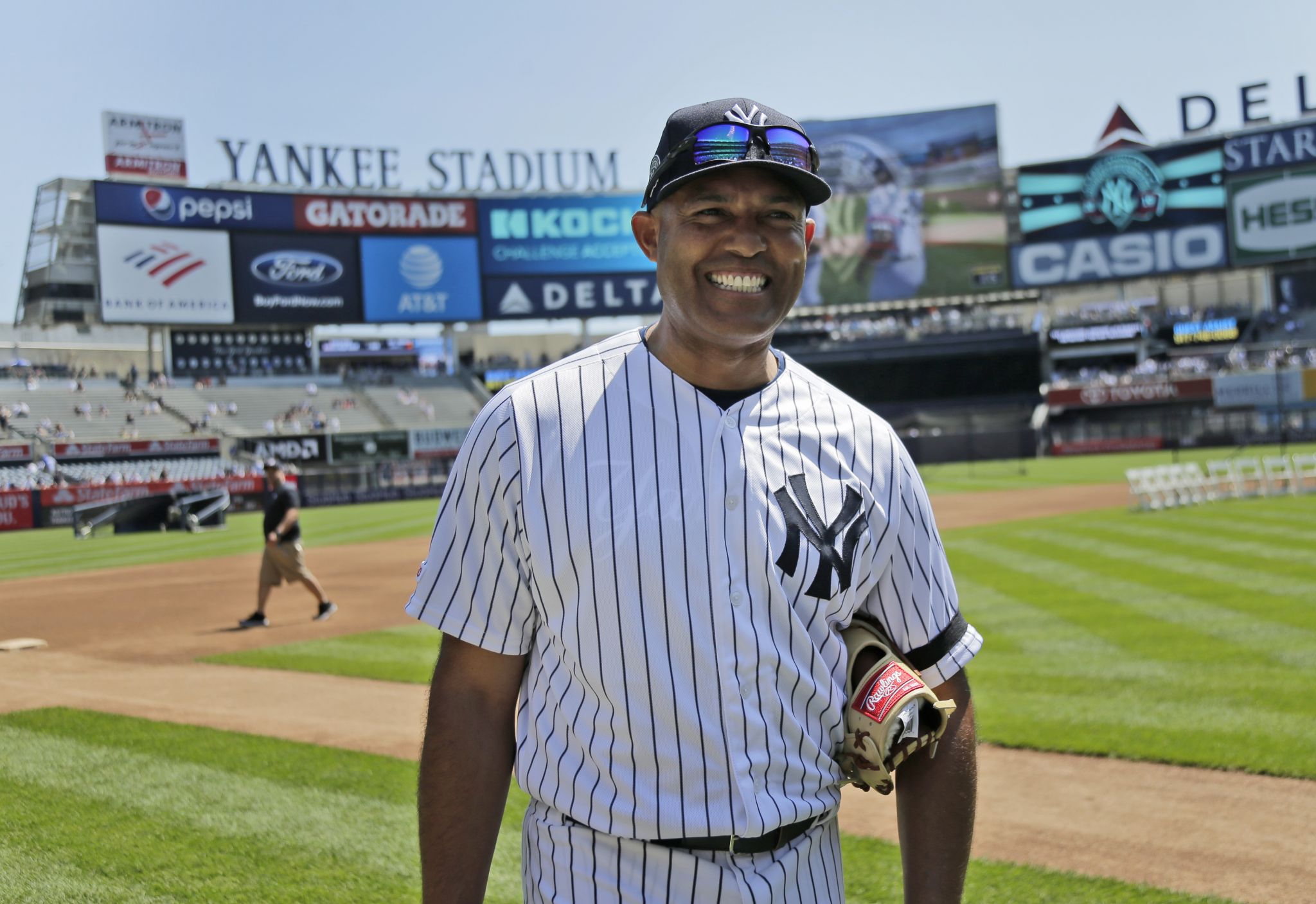 Former New York Yankees players, including Mariano Rivera, center, pose for  a picture during Old Timer's Day at Yankee Stadium, Sunday, June 23, 2019,  in New York. (AP Photo/Seth Wenig Stock Photo 