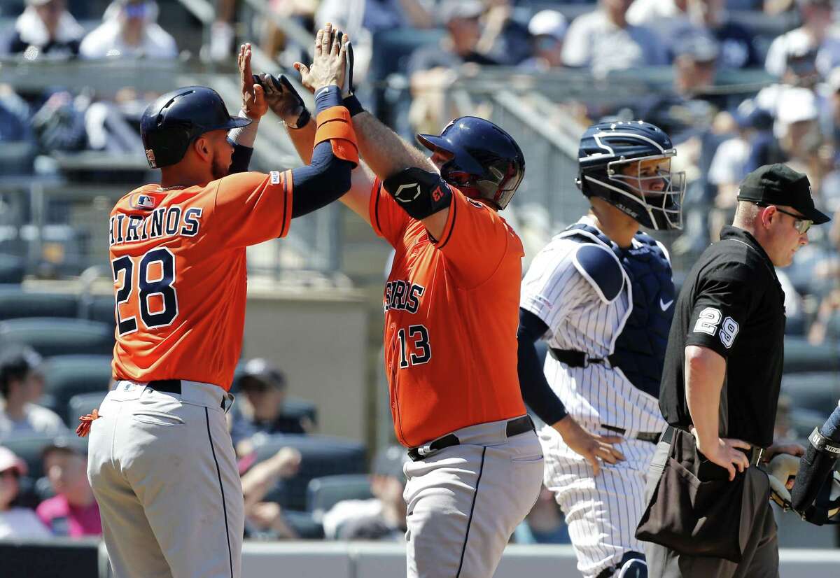 Houston Astros' George Springer celebrates his leadoff home run